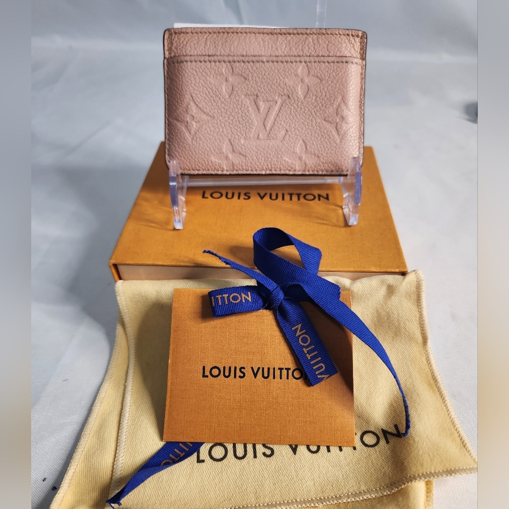 LOUIS VUITTON 
Empreinte Card Holder pink